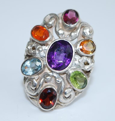 Lot 2742 - A sterling silver multi-stone dress ring,...