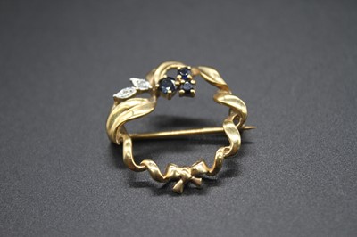 Lot 2821 - A contemporary 9ct gold sapphire and diamond...