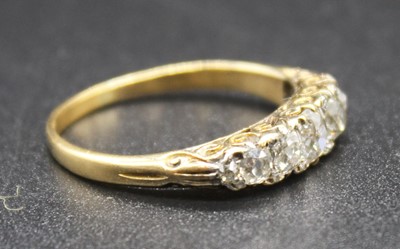 Lot 2811 - A yellow metal diamond half hoop eternity ring...