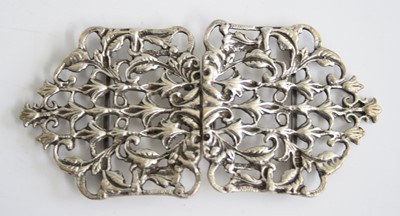 Lot 349 - A continental cast white metal belt buckle, 12cm