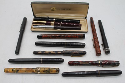 Lot 588 - A collection of vintage fountain pens, to...