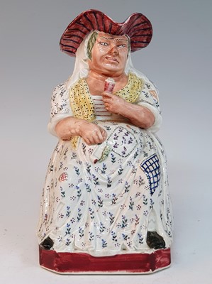 Lot 2075 - A circa 1830 Staffordshire 'Drunken Sal' Toby...
