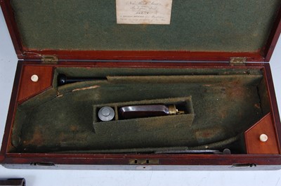 Lot 51 - A cased pair of 40-bore percussion duelling...