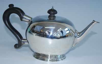 Lot 2165 - A George V silver bachelors teapot, of bullet...