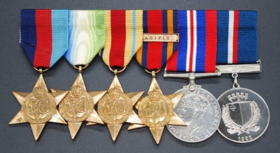 Lot 114 - A group of six medals to include 1939-1945...