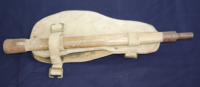 Lot 115 - A WW II entrenching tool, in webbing pouch,...