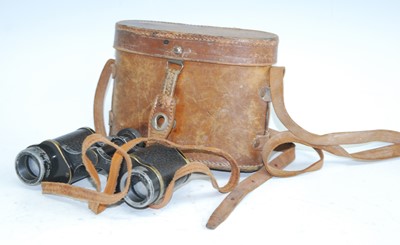 Lot 156 - A pair of WW I private purchase binoculars, in...