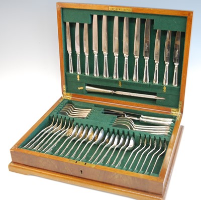 Lot 2176 - An Elizabeth II cased silver cutlery suite, in...