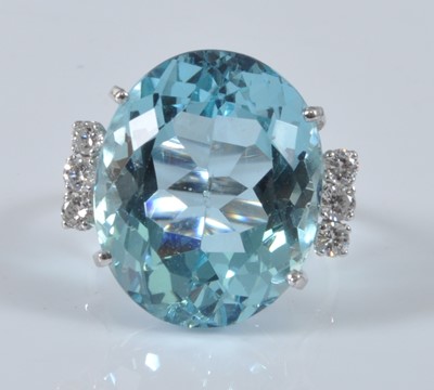 Lot 2208 - A white metal, aquamarine and diamond ring,...