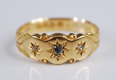 Lot 2188 - An Edwardian 18ct gold diamond three stone...