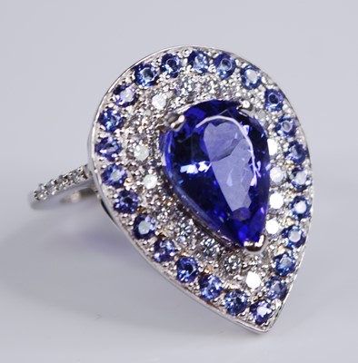 Lot 2249 - A white metal, tanzanite and diamond pear...