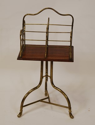 Lot 2573 - An Edwardian tubular brass and oak swivel book...