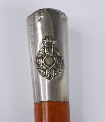 Lot 203 - A WW II period swagger stick, having a malacca...