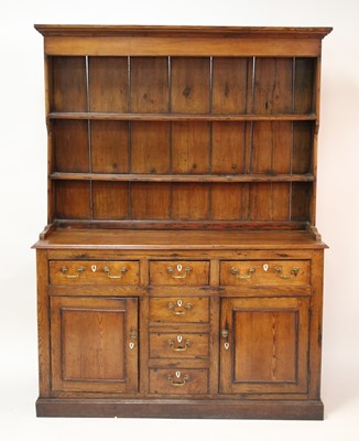 Lot 2553 - A French provincial pitched pine, elm and oak...