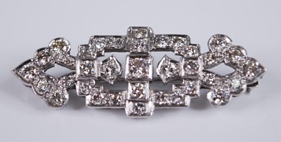 Lot 2193 - A white metal Art Deco diamond panel brooch,...