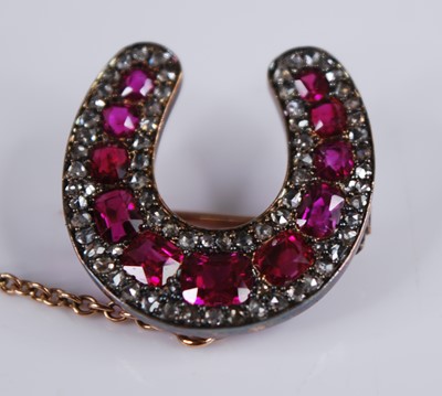 Lot 2183 - A late Victorian yellow metal, ruby and...