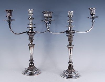 Lot 2129 - A pair of George III silver candlesticks, with...