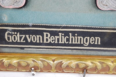 Lot 299 - A framed display of items relating to The 17th...