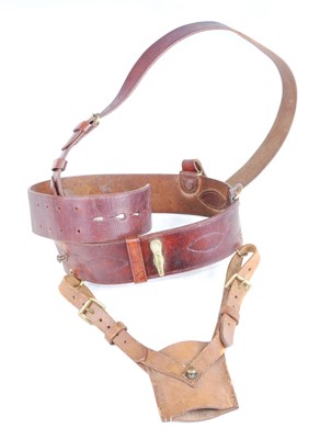 Lot 616 - A brown leather and brass mounted Sam Browne...