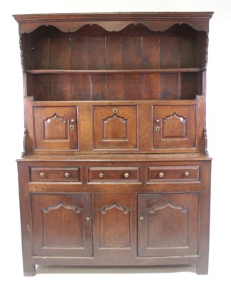 Lot 2584 - A George III joined oak dresser, the upper...
