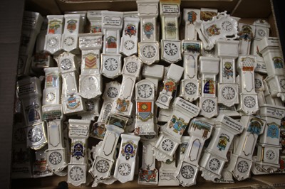 Lot 82 - A collection of crested ware long case clocks,...