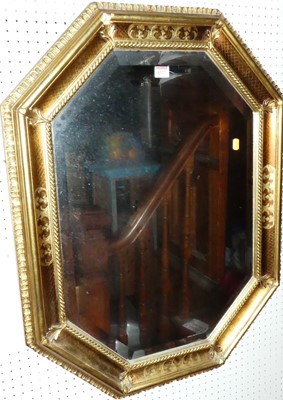 Lot 1127 - A contemporary giltwood octagonal bevelled...