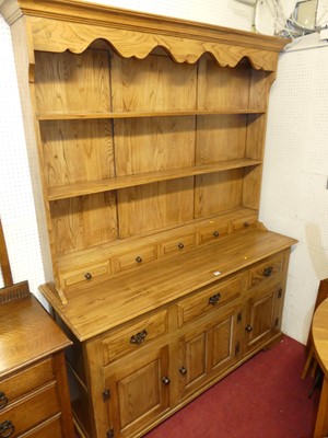 Lot 1131 - A contemporary joined light elm Welsh dresser,...
