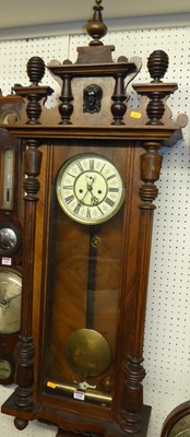 Lot 1140 - A late 19th century Vienna walnut regulator...