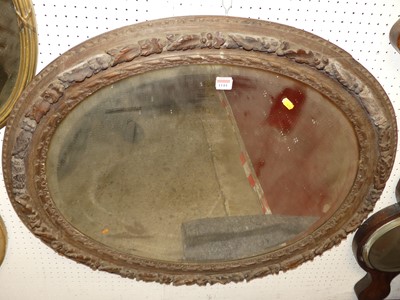 Lot 1144 - A 19th century floral relief carved oak oval...