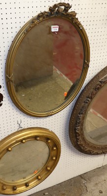 Lot 1146 - A circa 1900 gilt wood framed oval bevelled...