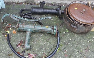 Lot 1149 - Two cast iron garden water pumps, together...