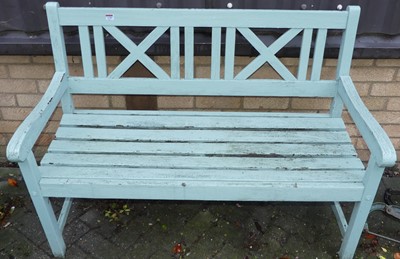 Lot 1150 - A blue painted teak slatted two-seater garden...