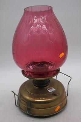 Lot 147 - A Victorian brass oil lamp, the large...