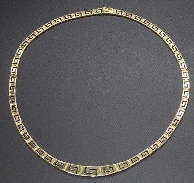 Lot 432 - A modern 14ct gold Greek Key link necklace,...