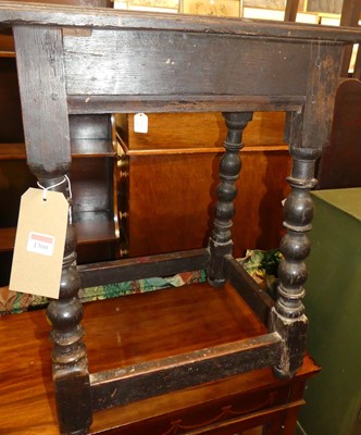 Lot 1359 - An antique joined oak joint stool, having a...