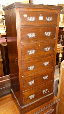 Lot 1418 - A late Victorian walnut narrow chest of six...