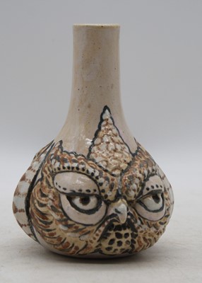 Lot 254 - A pottery vase, relief decorated with...