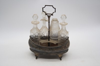 Lot 283 - A Victorian silver table cruet stand, London...