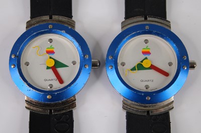 Lot 504 - A pair of Apple quartz wristwatches, case...