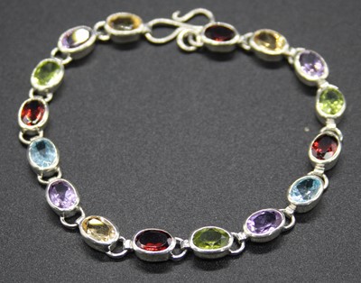 Lot 511 - A modern silver semi-precious set bracelet, to...