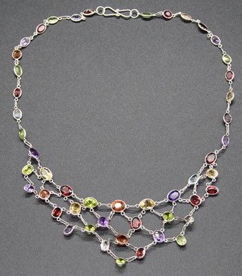Lot 512 - A modern silver and multi-stone set necklet,...