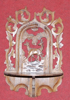 Lot 805 - A continental carved pine wall bracket,...