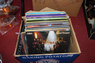 Lot 818 - Two boxes of various records to include Abba,...