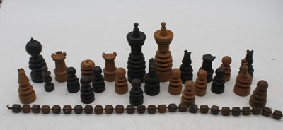 Lot 579 - A collection of turned box wood and ebony...