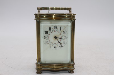 Lot 580 - An early 20th century lacquered brass carriage...