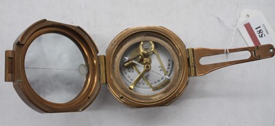 Lot 581 - A Brunton type brass cased compass, stamped No....