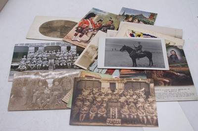 Lot 584 - A small collection of postcards to include WWI...