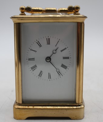 Lot 595 - A 20th century lacquered brass cased carriage...