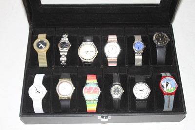 Lot 540 - A lady's Swatch wristwatch, having a rainbow...