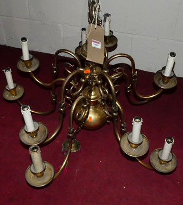 Lot 1069 - A Dutch style lacquered brass ten light...